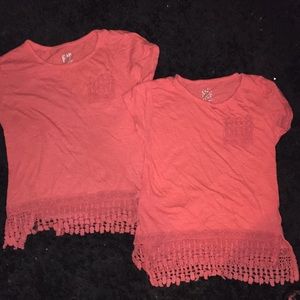 Two coral shirts